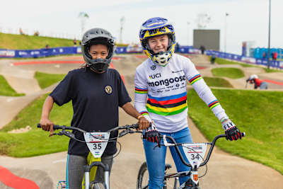 Khothalang Leuta and Payton Ridenour smile for photographs.