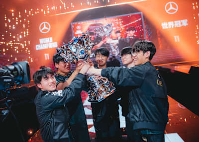 T1 team celebrate with the Summoner's Cup at League of Legends World Championships.