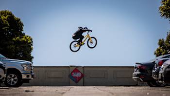 Danny MacAskill performs a trick. 