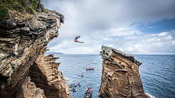 Rhiannan Iffland of Australia dives from a 21m cliff in São Miguel, Azores, Portugal, during the first competition day of the fourth stop of the Red Bull Cliff Diving World Series, June 20, 2019.