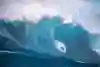 Surfer Kai Lenny pictured surfing at Jaws in Hawaii.