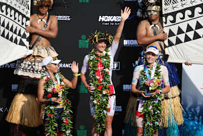 Heather Jackson (third place), Daniela Ryf (first place) and Lucy Charles (second place) celebrate their victories at the Ironman World Championships in Kona, Hawaii, USA on 14 October, 2017.