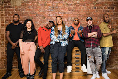 A photo of The Cut host Tiffany Calver (centre) with competitors A Class, Shay D, Nic da Kid, Tokyo, Shin and Kadiata.