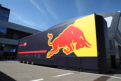 Team Trucks Parked In The Paddock