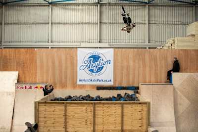 Kieran Reilly practices a triple flair trick at the foam pit at Asylum Skatepark in Nottingham, England.