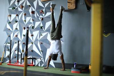 Kochi fitness trainer Nipun Viju performs calisthenics exercises in a gym.
