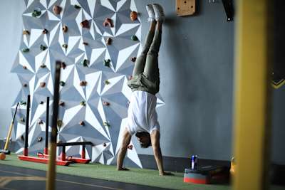 Kochi fitness trainer Nipun Viju performs calisthenics exercises in a gym.