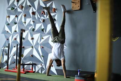 Kochi fitness trainer Nipun Viju performs calisthenics exercises in a gym.