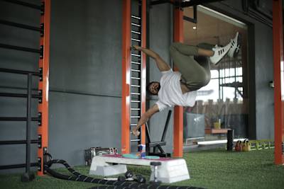 Kochi fitness trainer Nipun Viju performs calisthenics exercises in a gym.