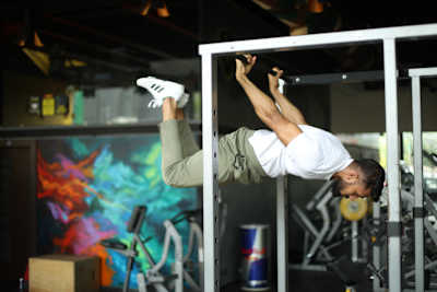 Kochi fitness trainer Nipun Viju performs calisthenics exercises in a gym.