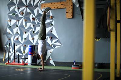 Kochi fitness trainer Nipun Viju performs calisthenics exercises in a gym.