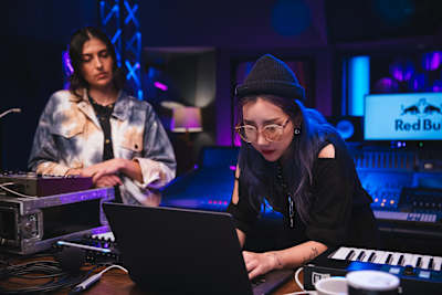 TOKiMONSTA and Anna Lunoe work at Remix Lab inside Red Bull Studios in Santa Monica in 2019.