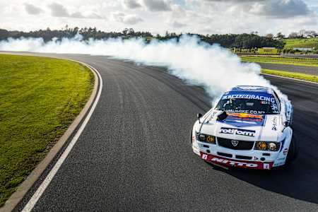 'Mad' Mike Whiddett performs in his MADBUL RX7 at Hampton Downs race track, Waikato, New Zealand on May 09, 2018 