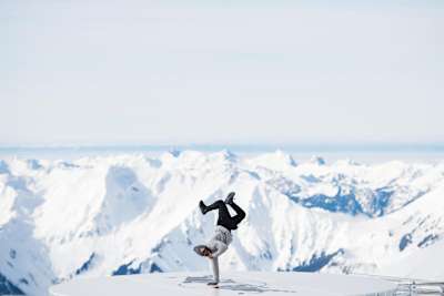 B-boy Junior performs on top of a mountain in the Swiss Alps.