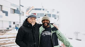Reto Gurtner and Selema Masekela pose together during filming of Burton My Turn snowboard show.
