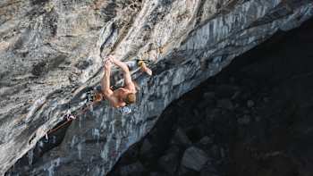Jakob Schubert climbs a 9c route