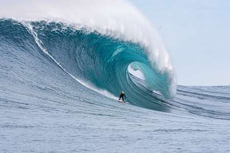 Izzi Gomez surfs a huge wave at Cortes Bank, California