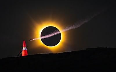 Mike Brewer flies beneath a total solar eclipse in Spain