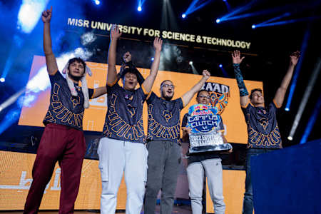 Players celebrate their victory at Egypt's Red Bull Campus Clutch National Final on December 1, 2022.