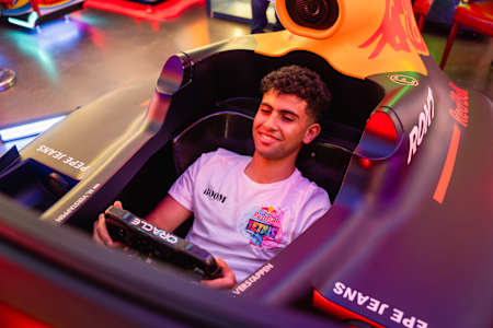 An attendee tries out an official Red Bull F1 simulator during the Red Bull Tetris® National Final in Cairo, Egypt on November 11, 2025.