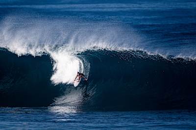 Eli Hanneman surfs at Pipeline in Haleiwa, Hawaii, USA on January 21, 2022 