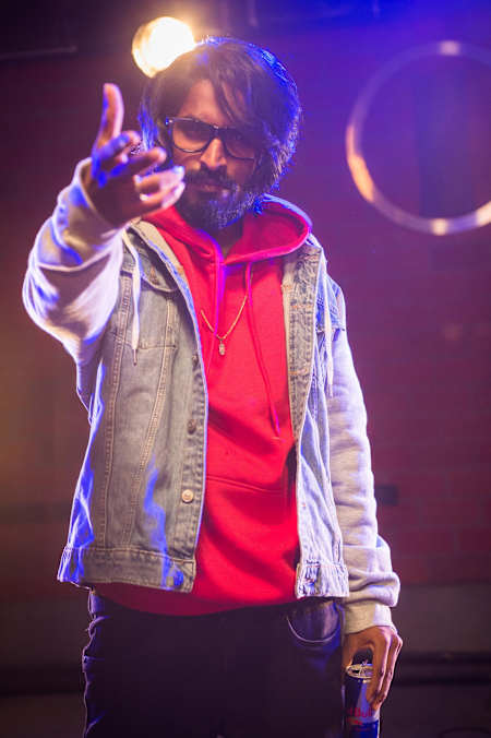 Emiway Bantai posing for the camera with a Red Bull can