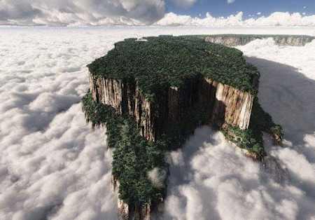 Sheer tree-topped mountains rise out of the clouds in Venezuela.