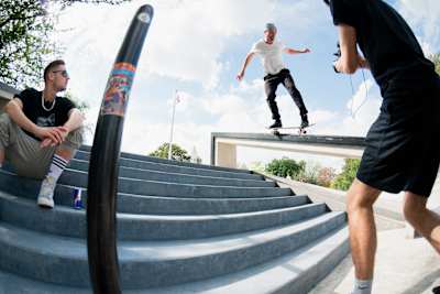 Vladik Scholz performing a BS 50-50 in front of Rewinside during their YouTube video production in Cologne, Germany on August 24, 2020.