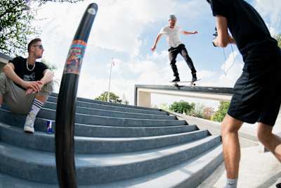 Vladik Scholz performing a BS 50-50 in front of Rewinside during their YouTube video production in Cologne, Germany on August 24, 2020.