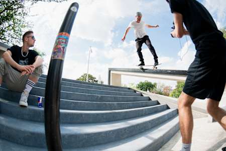 Vladik Scholz performing a BS 50-50 in front of Rewinside during their YouTube video production in Cologne, Germany on August 24, 2020.