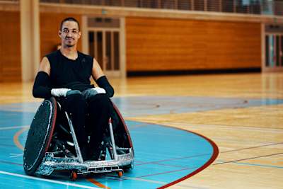 David M'Zee, paralysed in a trampoline accident in 2010, walked across the start line at Wings for Life World Run 2019 in Switzerland.