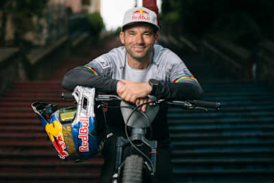 Posing on his mountain bike, Czech rider Tomáš Slavík checks out the Red Bull Cerro Abajo Genova 2024 venue