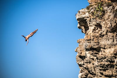 Aidan Heslop from the 28m platform during the final competition day of the seventh stop of the Red Bull Cliff Diving World Series in Polignano a Mare, Italy on September 18, 2022.