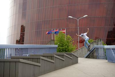 Madars Apse jams into a ride-on grind at a quirky spot in Latvia