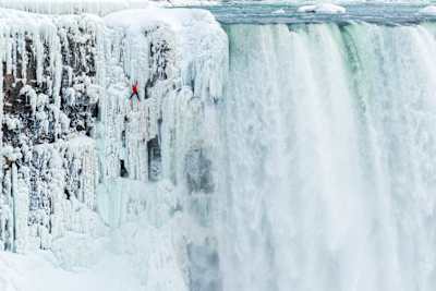 Will Gadd ice climbs the first ascent of Niagara Falls in Niagara Falls, USA, on January 27, 2015.