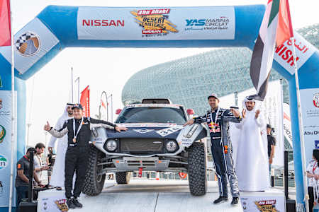 A photo of Cyril Despres and his co-driver Dani Oliveras at the end of the 2019 Abu Dhabi Desert Challenge.