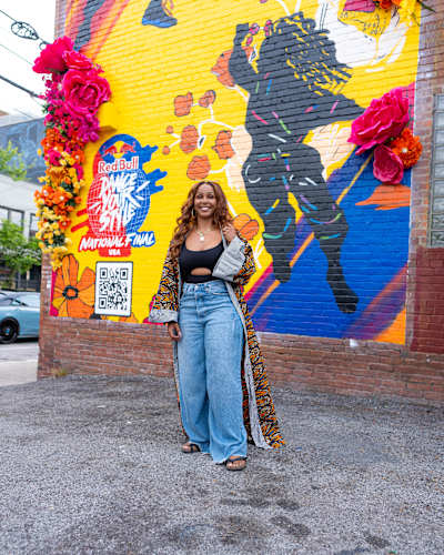 Chanell Angelique Skyers in front of her Red Bull Dance Your Style mural 