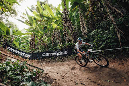 Pauline Ferrand-Prévot racing at the Petropolis round of the 2022 UCI MTB XCO World Cup.
