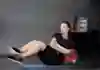 Athlete Ashling Thompson performs a Russian Twist exercise during training.