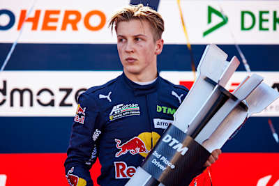 Rookie driver Liam Lawson with the runner-up trophy for the 2021 DTM season.