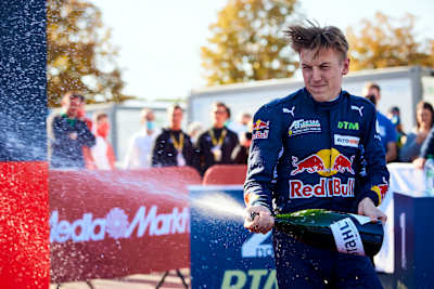 Liam Lawson celebrates his 18th podium of the 2021 DTM season at the Norisring.