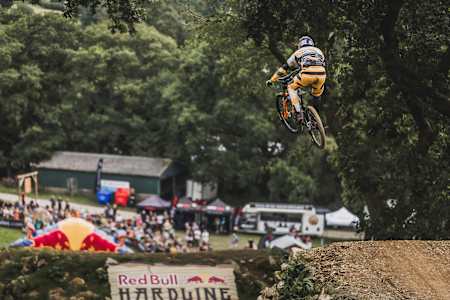 Gee Atherton heading to the finish line of the Red Bull Hardline 2022 course.