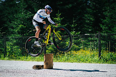Lars Forster performs a bunny hop on a training ride in Switzerland.