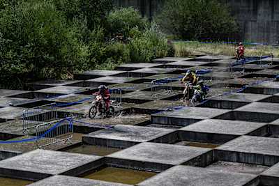 Competitors perform during the second off road day of FIM Hard Enduro World Championship 2023 Stop 3 - Red Bull Romaniacs in Sibiu, Romania on July 27, 2023.