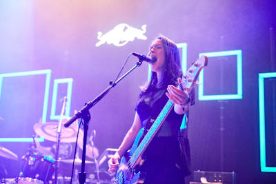 A photo of indie performer Mitski playing live in Chicago.