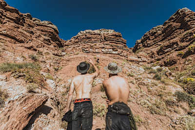 Gee Atherton and his build crew look for lines at Red Bull Rampage 2023 in Virgin, Utah, USA.