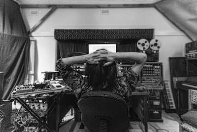 A photo of producer Nick Herrera working at Melbourne's recording-studio-cum-house-share, The Grove.