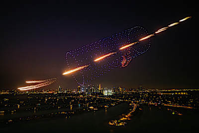Drones create a gigantic Red Bull can in the Dubai night skies at the Red Bull Ultimate Aerial Obstacle Course challenge 