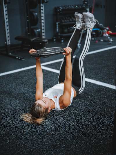 Iva Jovic works on her core during a workout session.