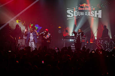 Larry June on stage with T3 and Young RJ from Slum Village
